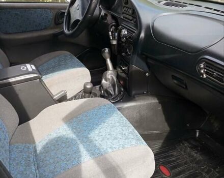 Серый Шевроле Нива, объемом двигателя 1.7 л и пробегом 218 тыс. км за 4150 $, фото 9 на Automoto.ua