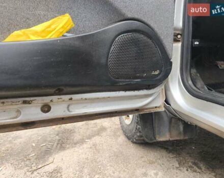 Серый Шевроле Нива, объемом двигателя 1.69 л и пробегом 140 тыс. км за 4000 $, фото 1 на Automoto.ua
