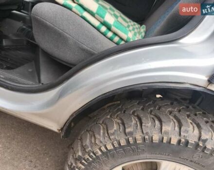 Серый Шевроле Нива, объемом двигателя 1.69 л и пробегом 140 тыс. км за 4000 $, фото 6 на Automoto.ua