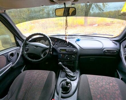 Сірий Шевроле Нива, об'ємом двигуна 1.7 л та пробігом 242 тис. км за 2400 $, фото 6 на Automoto.ua