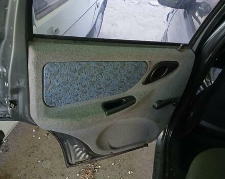 Серый Шевроле Нива, объемом двигателя 1.69 л и пробегом 148 тыс. км за 3500 $, фото 6 на Automoto.ua