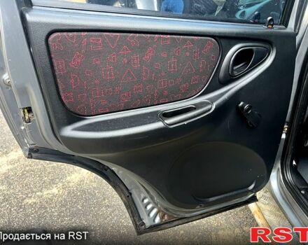 Серый Шевроле Нива, объемом двигателя 1.7 л и пробегом 195 тыс. км за 3300 $, фото 10 на Automoto.ua