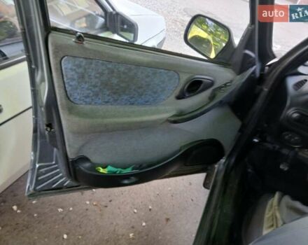 Серый Шевроле Нива, объемом двигателя 1.69 л и пробегом 148 тыс. км за 3500 $, фото 4 на Automoto.ua