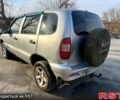 Серый Шевроле Нива, объемом двигателя 1.7 л и пробегом 250 тыс. км за 2400 $, фото 3 на Automoto.ua