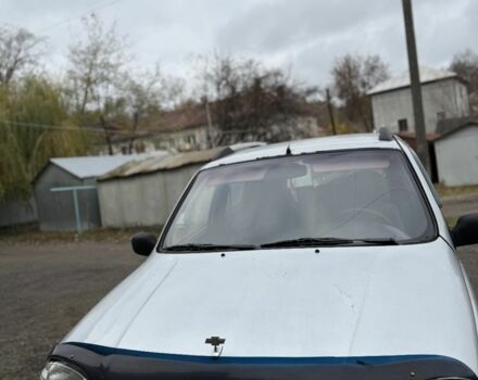 Серый Шевроле Нива, объемом двигателя 0 л и пробегом 223 тыс. км за 3900 $, фото 1 на Automoto.ua