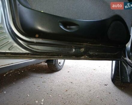 Серый Шевроле Нива, объемом двигателя 1.69 л и пробегом 148 тыс. км за 3500 $, фото 5 на Automoto.ua