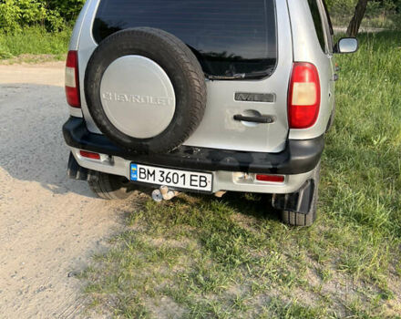 Серый Шевроле Нива, объемом двигателя 1.69 л и пробегом 244 тыс. км за 3500 $, фото 2 на Automoto.ua