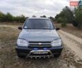 Серый Шевроле Нива, объемом двигателя 1.7 л и пробегом 162 тыс. км за 4200 $, фото 1 на Automoto.ua