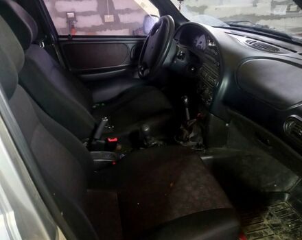 Серый Шевроле Нива, объемом двигателя 1.7 л и пробегом 230 тыс. км за 2600 $, фото 5 на Automoto.ua