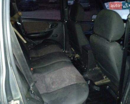Серый Шевроле Нива, объемом двигателя 1.7 л и пробегом 200 тыс. км за 3600 $, фото 5 на Automoto.ua