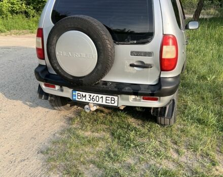 Серый Шевроле Нива, объемом двигателя 1.7 л и пробегом 247 тыс. км за 3500 $, фото 2 на Automoto.ua