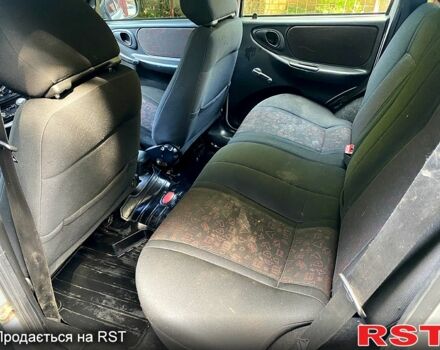 Серый Шевроле Нива, объемом двигателя 1.7 л и пробегом 200 тыс. км за 3350 $, фото 6 на Automoto.ua