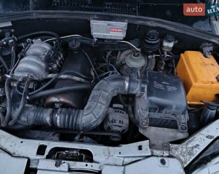 Сірий Шевроле Нива, об'ємом двигуна 1.69 л та пробігом 261 тис. км за 4000 $, фото 5 на Automoto.ua