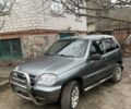 Серый Шевроле Нива, объемом двигателя 1.69 л и пробегом 280 тыс. км за 4500 $, фото 1 на Automoto.ua