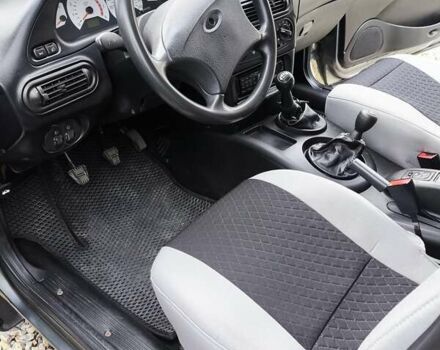 Серый Шевроле Нива, объемом двигателя 1.7 л и пробегом 153 тыс. км за 3800 $, фото 9 на Automoto.ua