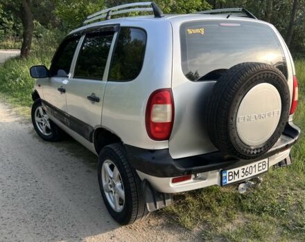 Серый Шевроле Нива, объемом двигателя 1.7 л и пробегом 247 тыс. км за 3500 $, фото 1 на Automoto.ua