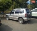 Серый Шевроле Нива, объемом двигателя 1.69 л и пробегом 220 тыс. км за 2700 $, фото 2 на Automoto.ua