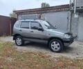 Серый Шевроле Нива, объемом двигателя 1.69 л и пробегом 93 тыс. км за 6500 $, фото 1 на Automoto.ua
