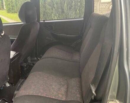 Серый Шевроле Нива, объемом двигателя 1.7 л и пробегом 208 тыс. км за 4150 $, фото 6 на Automoto.ua