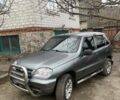 Серый Шевроле Нива, объемом двигателя 1.69 л и пробегом 280 тыс. км за 4500 $, фото 1 на Automoto.ua