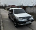 Серый Шевроле Нива, объемом двигателя 1.7 л и пробегом 123 тыс. км за 3700 $, фото 2 на Automoto.ua