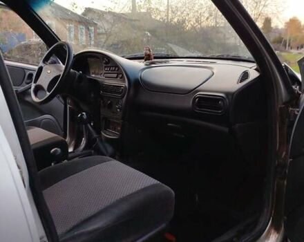 Сірий Шевроле Нива, об'ємом двигуна 1.7 л та пробігом 130 тис. км за 5500 $, фото 12 на Automoto.ua