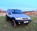 Серый Шевроле Нива, объемом двигателя 1.7 л и пробегом 200 тыс. км за 4000 $, фото 1 на Automoto.ua
