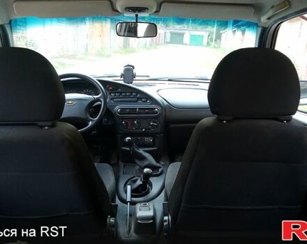 Серый Шевроле Нива, объемом двигателя 1.7 л и пробегом 233 тыс. км за 3600 $, фото 4 на Automoto.ua