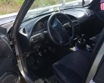 Серый Шевроле Нива, объемом двигателя 1.7 л и пробегом 213 тыс. км за 3500 $, фото 12 на Automoto.ua