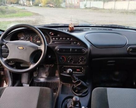 Сірий Шевроле Нива, об'ємом двигуна 1.7 л та пробігом 130 тис. км за 5500 $, фото 3 на Automoto.ua