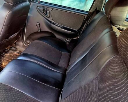 Серый Шевроле Нива, объемом двигателя 1.7 л и пробегом 300 тыс. км за 4500 $, фото 7 на Automoto.ua