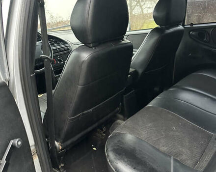 Серый Шевроле Нива, объемом двигателя 1.69 л и пробегом 277 тыс. км за 5200 $, фото 9 на Automoto.ua