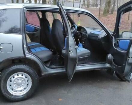 Серый Шевроле Нива, объемом двигателя 1.7 л и пробегом 83 тыс. км за 4500 $, фото 5 на Automoto.ua