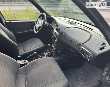 Серый Шевроле Нива, объемом двигателя 1.69 л и пробегом 195 тыс. км за 2400 $, фото 18 на Automoto.ua