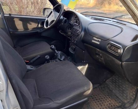 Сірий Шевроле Нива, об'ємом двигуна 1.7 л та пробігом 270 тис. км за 1900 $, фото 7 на Automoto.ua