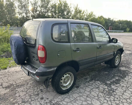 Серый Шевроле Нива, объемом двигателя 1.69 л и пробегом 195 тыс. км за 2400 $, фото 11 на Automoto.ua