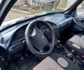 Серый Шевроле Нива, объемом двигателя 1.7 л и пробегом 220 тыс. км за 3500 $, фото 1 на Automoto.ua