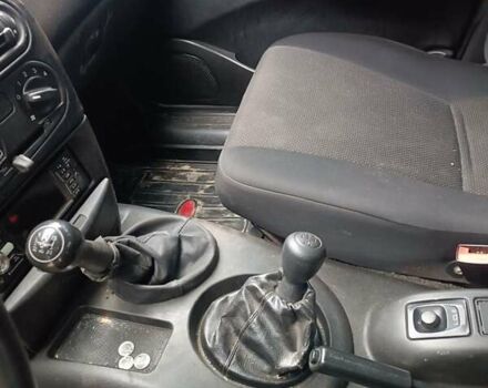 Серый Шевроле Нива, объемом двигателя 1.7 л и пробегом 193 тыс. км за 3000 $, фото 6 на Automoto.ua