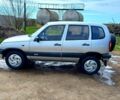 Серый Шевроле Нива, объемом двигателя 1.7 л и пробегом 220 тыс. км за 3500 $, фото 2 на Automoto.ua