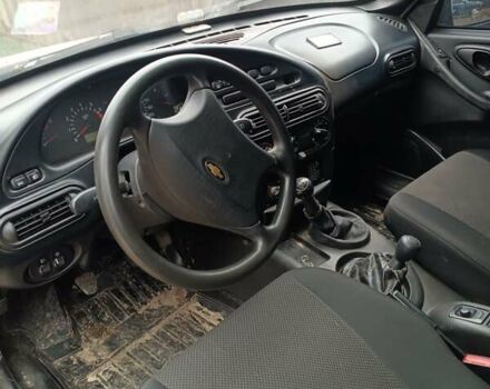 Серый Шевроле Нива, объемом двигателя 1.7 л и пробегом 193 тыс. км за 3000 $, фото 5 на Automoto.ua