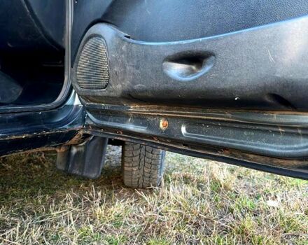 Серый Шевроле Нива, объемом двигателя 1.7 л и пробегом 240 тыс. км за 3400 $, фото 6 на Automoto.ua