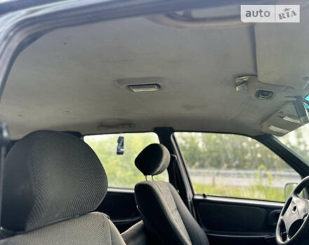 Серый Шевроле Нива, объемом двигателя 1.69 л и пробегом 195 тыс. км за 2400 $, фото 20 на Automoto.ua