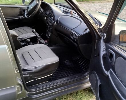 Сірий Шевроле Нива, об'ємом двигуна 0 л та пробігом 160 тис. км за 4100 $, фото 12 на Automoto.ua