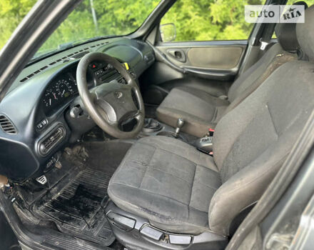 Серый Шевроле Нива, объемом двигателя 1.69 л и пробегом 195 тыс. км за 2400 $, фото 21 на Automoto.ua