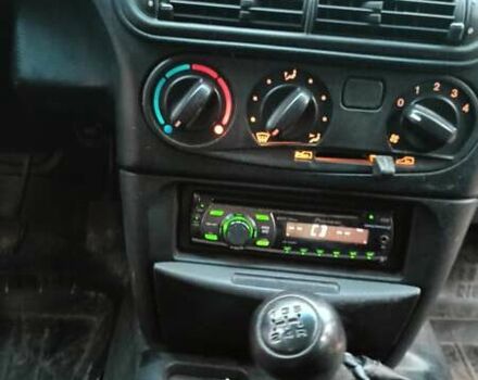 Серый Шевроле Нива, объемом двигателя 1.69 л и пробегом 207 тыс. км за 2000 $, фото 3 на Automoto.ua