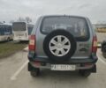 Серый Шевроле Нива, объемом двигателя 1.7 л и пробегом 379 тыс. км за 2145 $, фото 2 на Automoto.ua