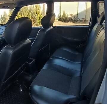 Серый Шевроле Нива, объемом двигателя 1.69 л и пробегом 140 тыс. км за 5500 $, фото 7 на Automoto.ua