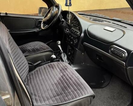 Серый Шевроле Нива, объемом двигателя 1.7 л и пробегом 144 тыс. км за 7500 $, фото 13 на Automoto.ua