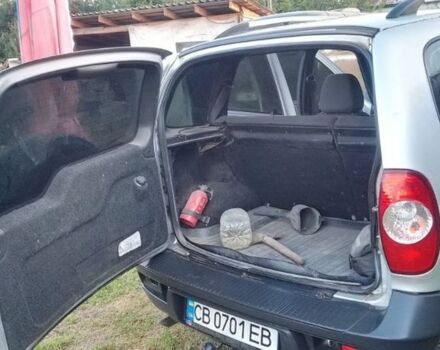 Серый Шевроле Нива, объемом двигателя 1.7 л и пробегом 155 тыс. км за 5200 $, фото 7 на Automoto.ua