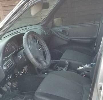 Серый Шевроле Нива, объемом двигателя 1.69 л и пробегом 155 тыс. км за 5200 $, фото 7 на Automoto.ua